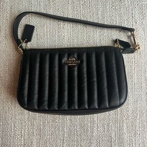 Black Coach clutch. Never used